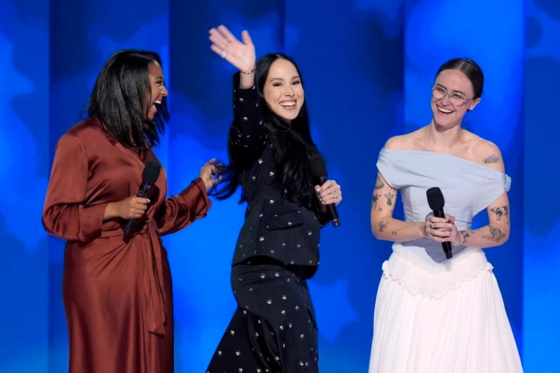 Helena Hudlin, from left, Meena Harris and Ella Emhoff depart after speaking during the Democratic National Convention Thursday, Aug. 22, 2024, in Chicago. (AP Photo/J. Scott Applewhite)