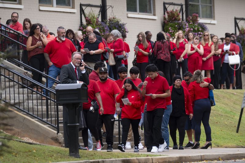 People arrive for the funeral of Apalachee High School shooting victim Mason Schermerhorn in Jefferson, Ga., on Saturday, Sept. 14, 2024. (Ben Gray/Atlanta Journal-Constitution via AP)