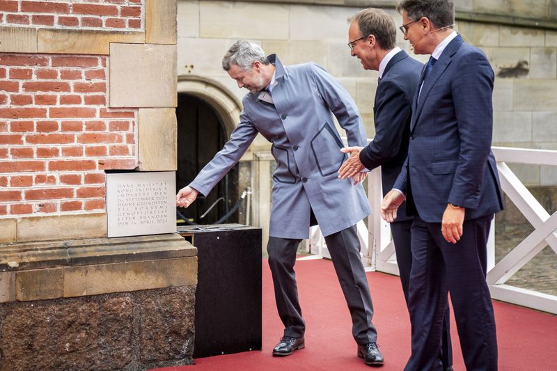 Denmark's King Frederik X lays the foundation stone for the reconstruction of the Stock Exchange in Copenhagen, Thursday, Sept. 26, 2024. (Ida Marie Odgaard/Ritzau Scanpix via AP)