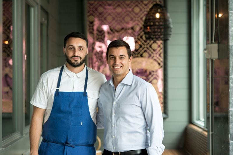 John and Fred Castellucci (left to right) at Iberian Pig Buckhead. Photo credit- Mia Yakel.