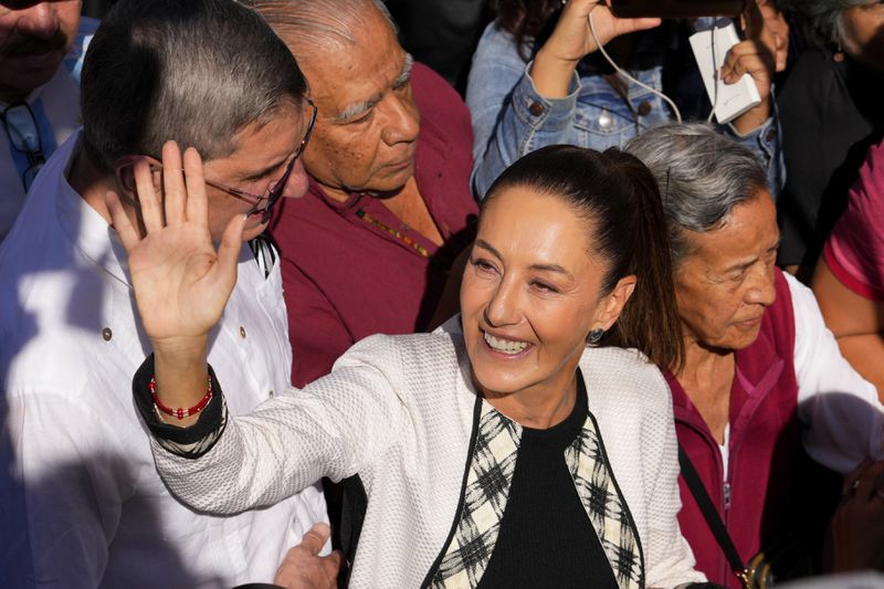 FILE - Ruling party presidential candidate Claudia Sheinbaum arrives to vote in the general election, in Mexico City, June 2, 2024. Sheinbaum, a climate scientist and former Mexico City mayor, will be sworn in as Mexico’s first woman president on Oct. 1. (AP Photo/Matias Delacroix, File)