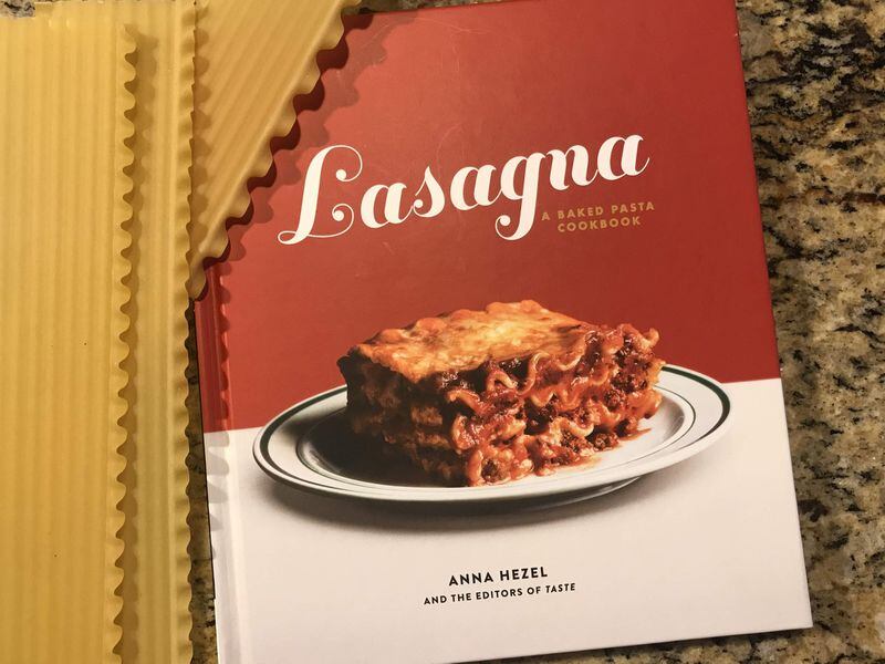 Newly published cookbook “Lasagna: A Baked Pasta Cookbook” by Anna Hezel and the Editors of TASTE (Clarkson Potter/Publishers, $16.99) includes 50 lasagna recipes, including Slow-Cooker Spinach Ricotta Lasagna prepared in a slow cooker. LIGAYA FIGUERAS / LFIGUERAS@AJC.COM