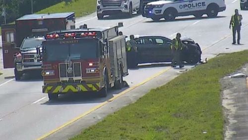 Emergency responders clean up a crash on Ga. 316 at Downing Creek Road in Dacula late Thursday afternoon.