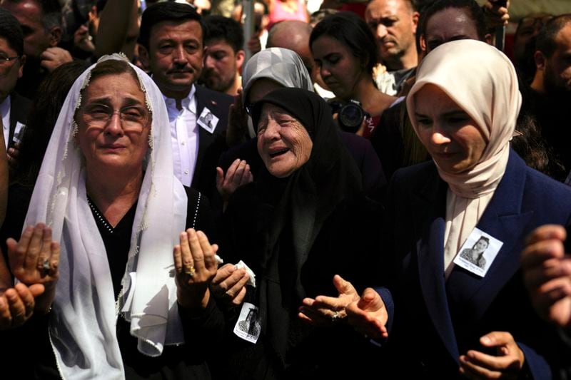 Relatives mourn the death of Aysenur Ezgi Eygi, a 26 year-old Turkish-American activist killed by the Israeli military, during her funeral in Didim, Turkey, Saturday, Sept. 14, 2024,(AP Photo/Khalil Hamra)