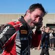 Keanu Reeves drives during the GR Cup Series auto race at Indianapolis Motor Speedway, Saturday, Oct. 5, 2024, in Indianapolis. (AP Photo/Darron Cummings)