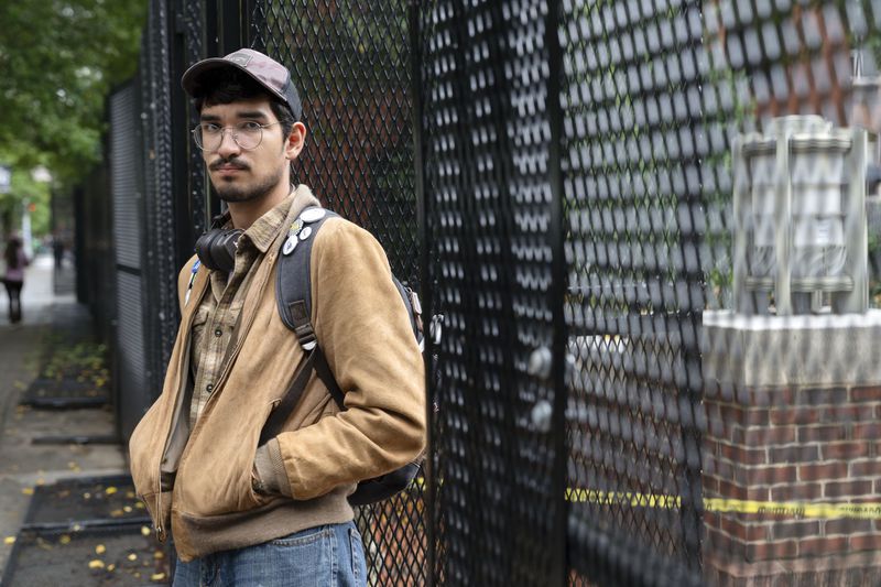 George Washington University student Ty Lindia poses for a photograph at the site of last spring's students tent encampment at George Washington University Yard in Washington, Wednesday, Oct. 2, 2024. (AP Photo/Jose Luis Magana)