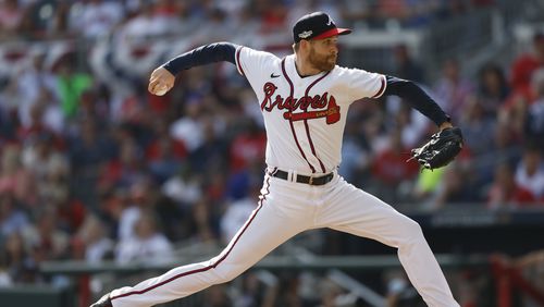 Collin McHugh relieves during the sixth inning of game one of the baseball playoff series between the Braves and the Phillies at Truist Park in Atlanta on Tuesday, October 11, 2022. (Jason Getz / Jason.Getz@ajc.com)