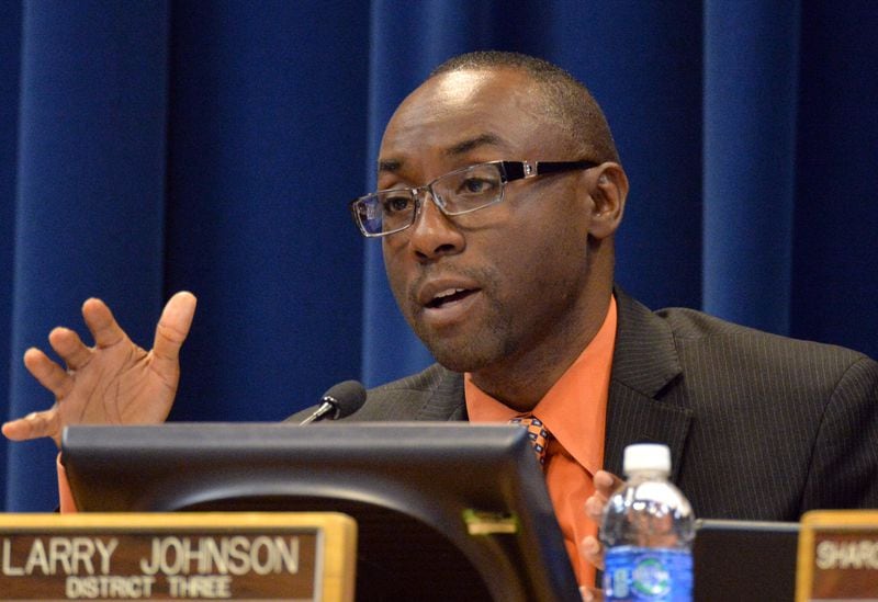 August 26, 2014 Decatur - DeKalb County Commissioner Larry Johnson speaks during a meeting at Dekalb County Government Administration Building in Decatur on Tuesday, August 26, 2014. A day after resigning from office, DeKalb County Commissioner Elaine Boyer announced in court Tuesday she pleaded guilty to federal charges accusing her of two schemes to pocket tens of thousands of dollars from taxpayers. HYOSUB SHIN / HSHIN@AJC.COM DeKalb County Commissioner Larry Johnson speaks during an Aug. 26 meeting. (HYOSUB SHIN / HSHIN@AJC.COM)