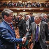 January 16, 2020 - Atlanta - Gov. Brian Kemp greets former U.S. Senator Johnny Isakson as he arrived to deliver his second State of the State address as the Georgia 2020 General Assembly continued for it's fourth legislative day. The governor and the house honored former U.S. Senator Johnny Isakson during the session.  Bob Andres / bandres@ajc.com