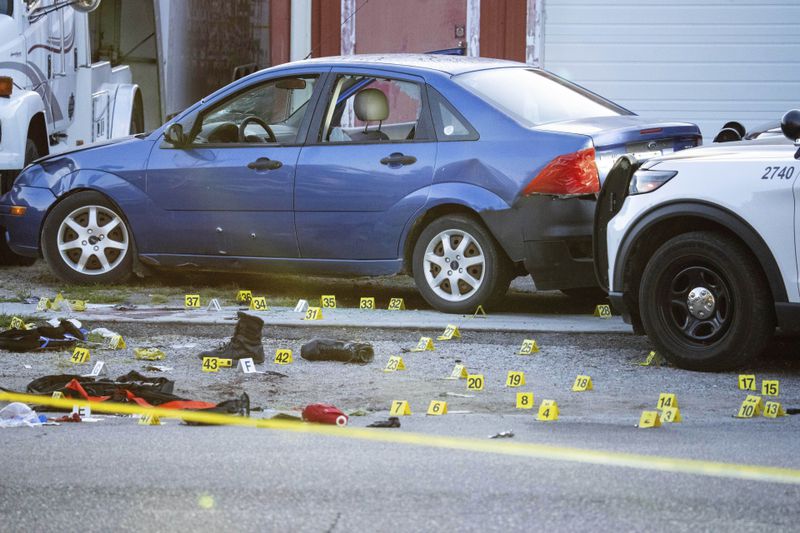 The scene where two Des Moines police officers were shot and the suspected shooter was killed by officers in an exchange of gunfire in Des Moines, Iowa, early Monday, Sept. 16, 2024. (Cody Scanlan/The Des Moines Register via AP)