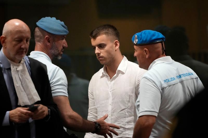 Gabriel Natale Hjorth leaves at the end of a hearing for the appeals trial in which he is facing murder charges for killing Italian Carabinieri paramilitary police officer Mario Cerciello Rega, in Rome, Wednesday, July 3, 2024. Two American men face a new trial in the slaying of an Italian plainclothes police officer during a botched sting operation after Italy's highest court threw out their convictions. (AP Photo/ Alessandra Tarantino)
