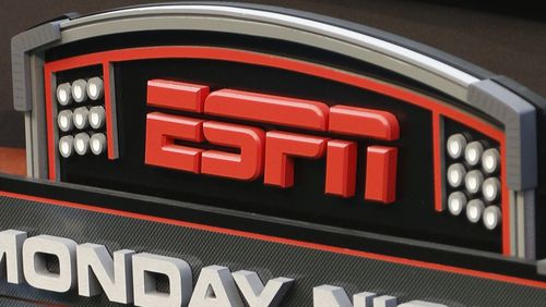 FILE - The ESPN logo is seen, Sept. 16, 2013, prior to an NFL football game between the Cincinnati Bengals and the Pittsburgh Steelers in Cincinnati. ESPN Bet, a rebranded sports-gambling app owned by Penn Entertainment, is set to launch Tuesday, Nov. 14, 2023. (AP Photo/David Kohl, File)