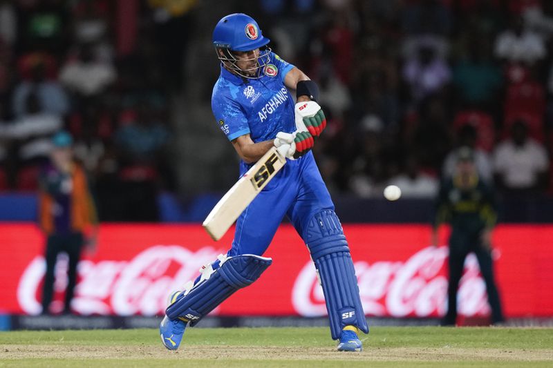 Afghanistan's Rahmanullah Gurbaz bats during the men's T20 World Cup cricket match between Afghanistan and Australia at Arnos Vale Ground, Kingstown, Saint Vincent and the Grenadines, Saturday, June 22, 2024. (AP Photo/Ramon Espinosa)