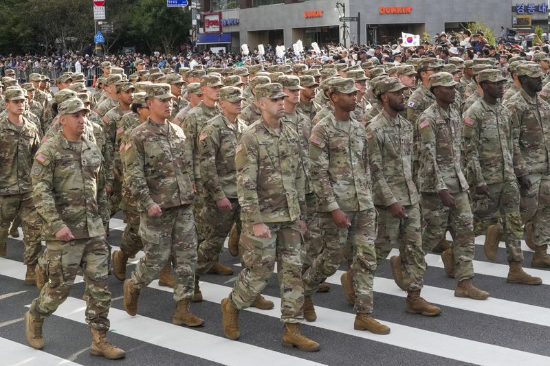 U.S. Army soldiers take part in a parade during the 76th Armed Forces Day ceremony in Seoul, South Korea, Tuesday, Oct. 1, 2024. (AP Photo/Ahn Young-joon)