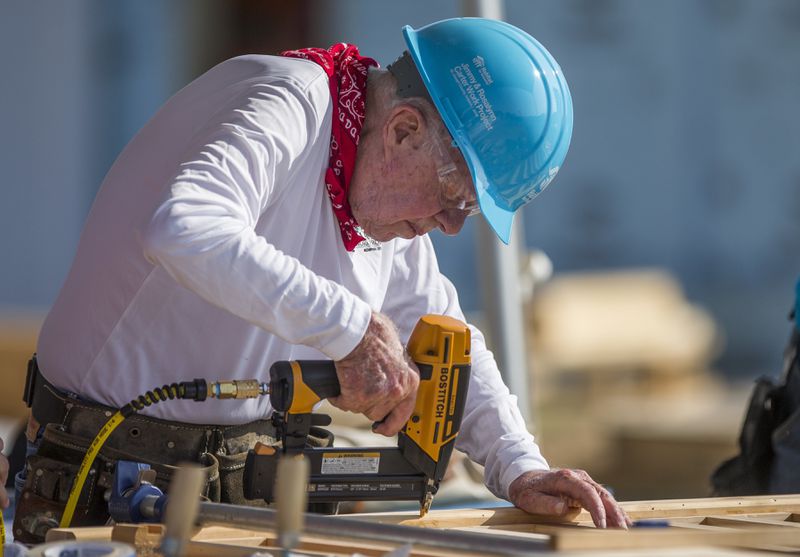 Former President Jimmy Carter works on a Habitat for Humanity project in Mishawaka, Ind., in 2018.