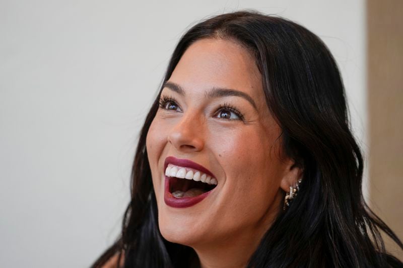 Model Ashley Graham arrives to attend the Alberta Ferretti Spring Summer 2025 collection, that was presented in Milan, Italy, Tuesday, Sept. 17, 2024. (AP Photo/Luca Bruno).