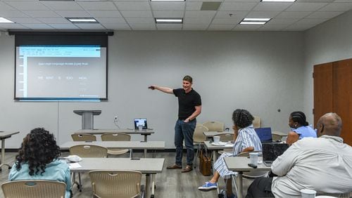 Joe Sutherland, director of the Center for AI Learning at Emory University, talks at the center's free summer educational program meeting in McDonough on Tuesday, July 2, 2024. It was one of nearly 20 free community classes Emory is holding in locations around Georgia. (Ziyu Julian Zhu / AJC)