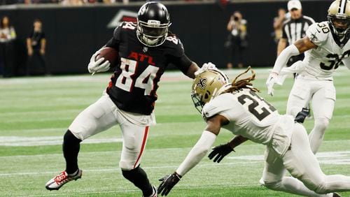 Falcons running back Cordarrelle Patterson avoids a tackle during the first half against the Saints on Sunday at Mercedes-Benz Stadium. (Miguel Martinez/Journal Constitutino/TNS)