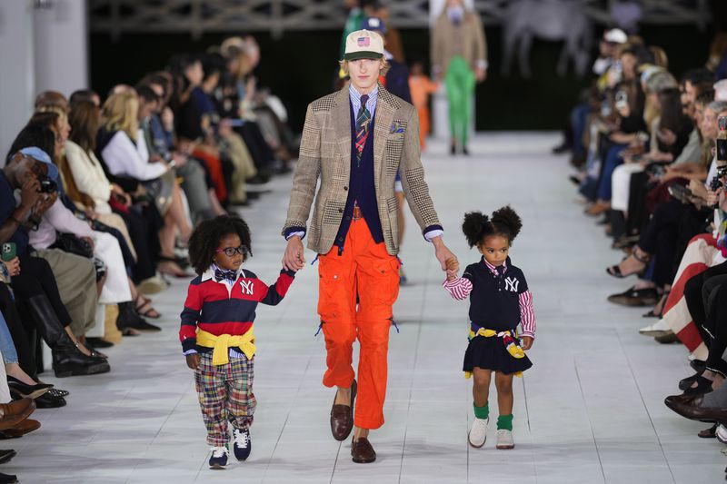 Models walk the runway during the Ralph Lauren Spring/Summer 2025 fashion show as part of New York Fashion Week on Thursday, Sept. 5, 2024, at Khalily Stables in Bridgehampton, N.Y. (Photo by Charles Sykes/Invision/AP)