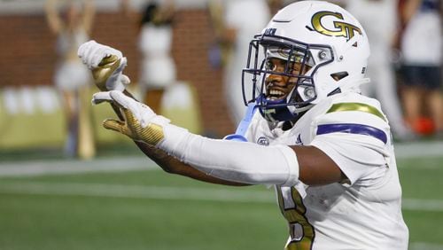 Georgia Tech Yellow Jackets wide receiver Malik Rutherford (8) celebrates after he scored a touchdown in the third quarter that gave Tech a 28-6 lead in a NCAA football game between the  Georgia State Panthers and Georgia Tech at Bobby Dodd Stadium in Atlanta on Saturday, Aug. 31, 2024. (Bob Andres for The Atlanta Journal-Constitution)