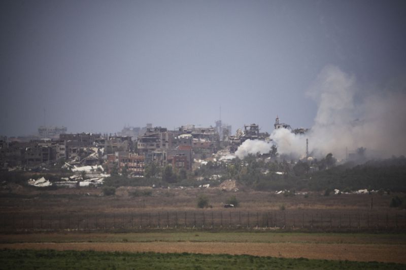 Smoke rises in the Gaza Strip as seen from southern Israel, Saturday, June 29, 2024. (AP Photo/Leo Correa)