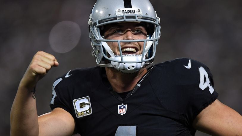 Oakland Raiders' Derek Carr knows risks of playing with ailing