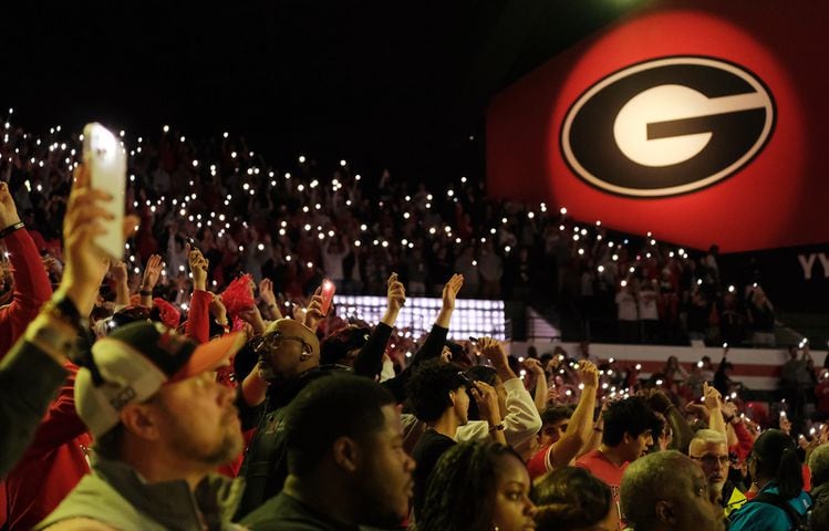 University of Georgia fans support the team during a close second half at Stegemen Coliseum Saturday. The Bulldogs lost to Tennessee 85-79. Nell Carroll for the AJC