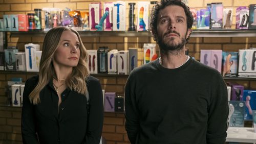 This image released by Netflix shows Kristen Bell, left, and Adam Brody in a scene from "Nobody Wants This." (Adam Rose/Netflix via AP)