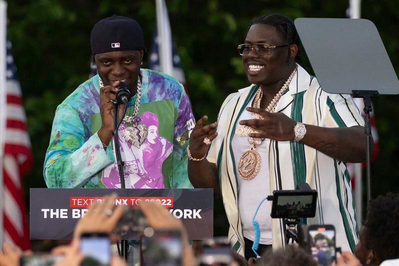 Rappers Sheff G, right, also known as Michael Williams, and Sleepy Hallow, also known as Tegan Chambers, join the Republican presidential candidate former President Donald Trump during a campaign rally in the south Bronx, Thursday, May. 23, 2024, in New York. (AP Photo/Yuki Iwamura)