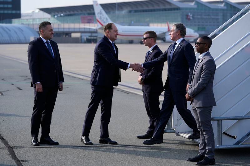 U.S. Secretary of State, Antony Blinken, second from right, welcomes by Ambassador of the United States to Poland Mark Brzezinski, second from left, as he arrives at Chopin Airport in Warsaw, Poland, Thursday, Sept. 12, 2024. (AP Photo/Mark Schiefelbein, Pool)