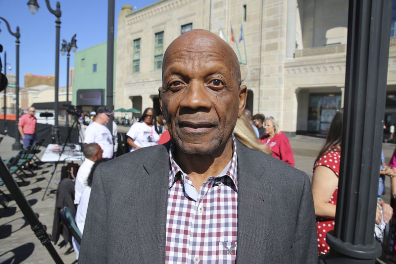 Roy DeBerry of the Student Nonviolent Coordinating Committee stands outside Boardwalk Hall in Atlantic City, N.J., Tuesday, Aug. 20, 2024, where he protested as a teenager when the Democratic National Convention was held at the hall in 1964. (AP Photo/Ted Shaffrey)