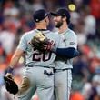 Detroit Tigers first baseman Spencer Torkelson (20) and third baseman Matt Vierling hug after the ninth inning of Game 1 of an AL Wild Card Series baseball game against the Houston Astros, Tuesday, Oct. 1, 2024, in Houston. (AP Photo/Kevin M. Cox)