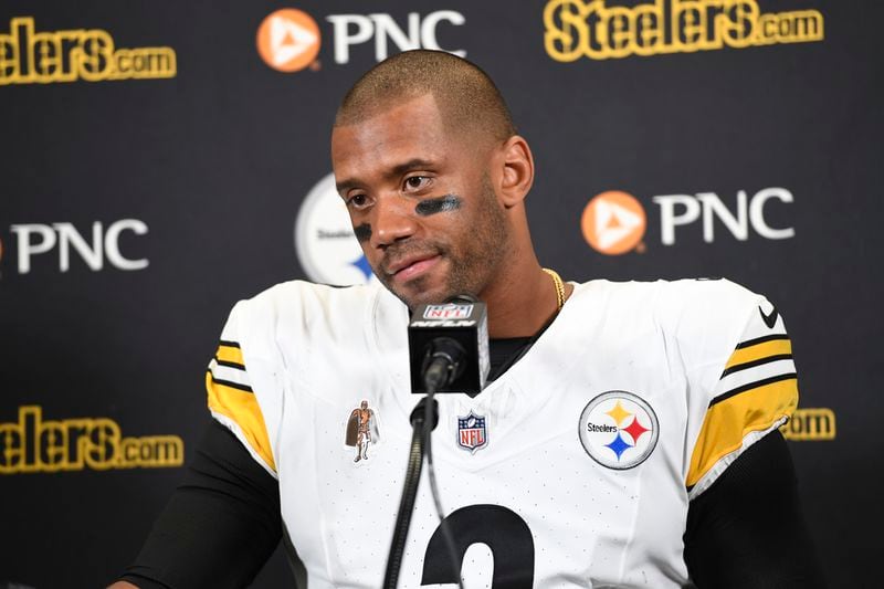 Pittsburgh Steelers quarterback Russell Wilson addresses the media after an NFL preseason football game against the Detroit Lions, Saturday, Aug. 24, 2024, in Detroit. (AP Photo/Jose Juarez)