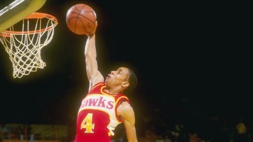 Spud Webb of the Hawks leaps to victory during a game against the Los Angeles Lakers at The Forum in Inglewood, California. Stephen Dunn  /Allsport