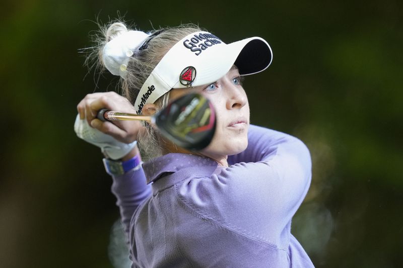 Nelly Korda hits from the 16th tee during the first round of the Women's PGA Championship golf tournament at Sahalee Country Club, Thursday, June 20, 2024, in Sammamish, Wash. (AP Photo/Gerald Herbert)