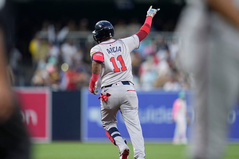 Atlanta Braves' Orlando Arcia rounds the bases after hitting a two-run home run during the fifth inning of a baseball game against the San Diego Padres, Friday, July 12, 2024, in San Diego. (AP Photo/Gregory Bull)