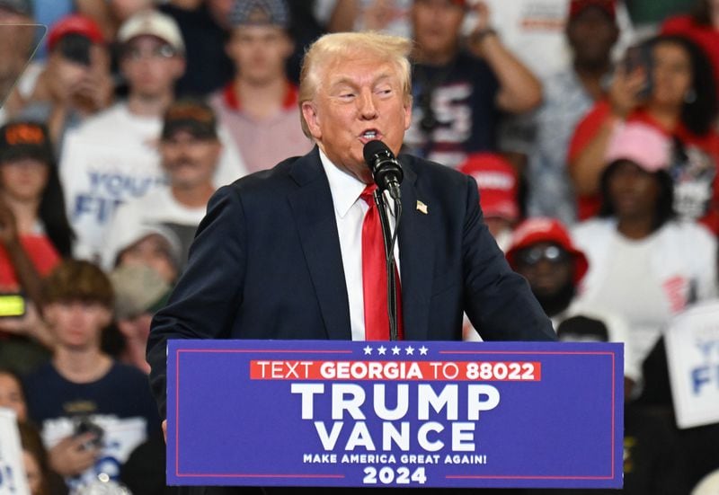 Former President Donald Trump speaks during a rally at the Georgia State University’s convocation center on Saturday, August 3, 2024 in Atlanta. Former President Donald Trump and Vice-Presidential candidate JD Vance are holding their first rally together in Georgia on Saturday at the same place – the GSU Convocation Center- Kamala Harris held hers earlier this week.  (Hyosub Shin / AJC)