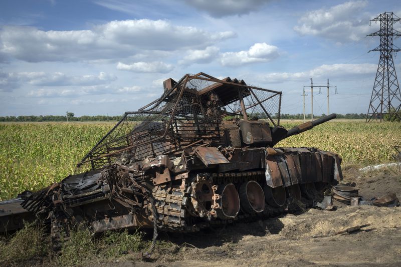 FILE - A destroyed Russian tank sits on a roadside near the town of Sudzha, Russia, in the Kursk region, on Aug. 16, 2024. This image was approved by the Ukrainian Defense Ministry before publication. (AP Photo, File)