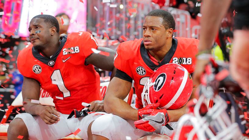 Georgia fans with a tribute to Nick Chubb 