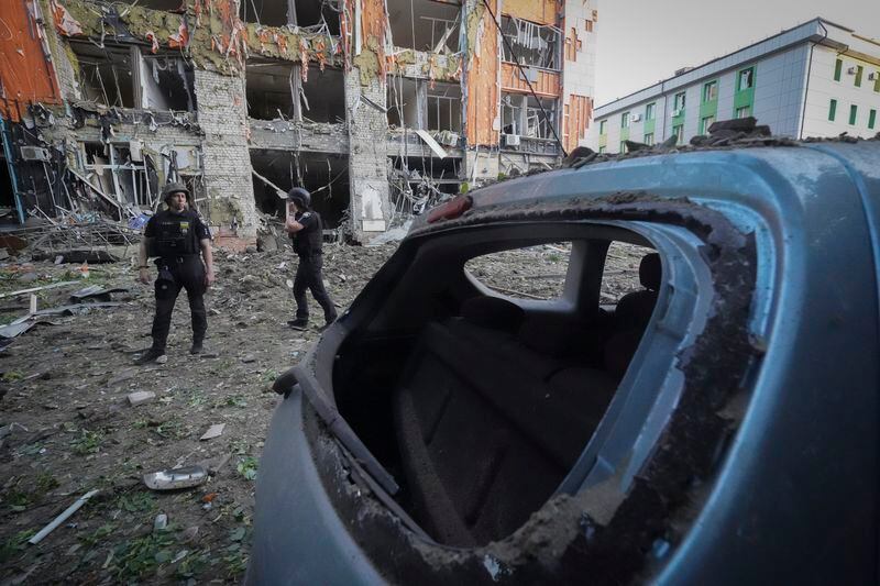 The city center is covered with debris after the Russian missile attack in Kharkiv, Ukraine, Saturday, May, 25, 2024. (AP Photo/Andrii Marienko)