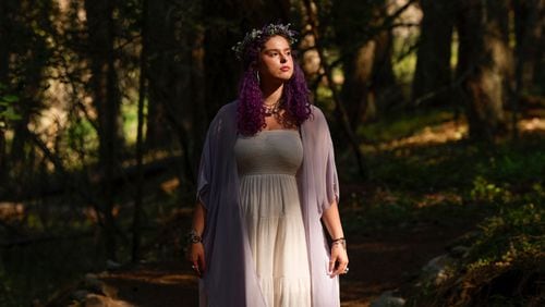 Olivia Vesovich, 20, poses for a portrait on her favorite hiking trail in Missoula, Montana on July 11, 2023. (Photo by Tailyr Irvine for The Washington Post via Getty Images)