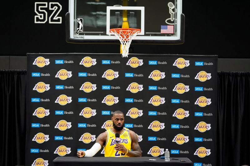 Los Angeles Lakers' LeBron James talks to reporters during the NBA basketball team's media day in El Segundo, Calif., Monday, Sept. 30, 2024. (AP Photo/Jae C. Hong)