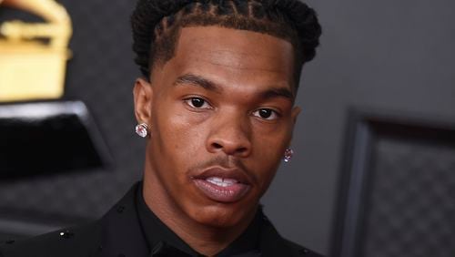 Lil Baby poses in the press room at the 63rd annual Grammy Awards at the Los Angeles Convention Center in Los Angeles, March 14, 2021. (Photo by Jordan Strauss/Invision/AP, File)