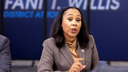 Fulton County District Attorney Fani Willis speaks during a press interview at the district attorney’s office in Atlanta on Friday, July 12, 2024. Public safety officials presented findings from a report on repeat offenders. (Arvin Temkar / AJC)