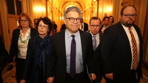 U.S. Sen. Al Franken and his wife Franni Bryson arrive at the U.S. Capitol Building on Dec. 7, 2017 before Franken announced his retirement. (Photo by Chip Somodevilla/Getty Images) *