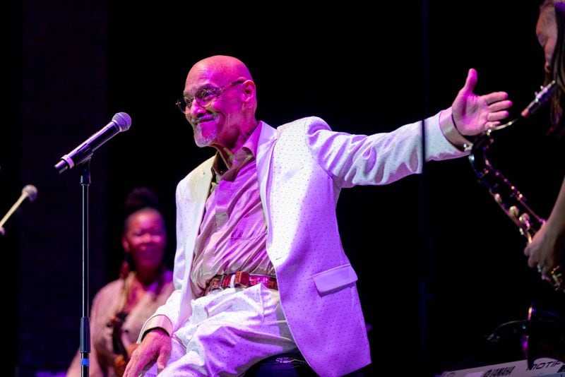 Musician Phil Perry sings on stage. The Stockbridge Amphitheater was host to the Karen Briggs Contempo Orchestra on Saturday, July 6, 2024. (Ben Hendren for the Atlanta Journal-Constitution)