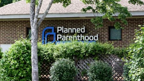 FILE - The Planned Parenthood Health Center located in Chapel Hill, N.C., is seen, May 3, 2024. Planned Parenthood will spend $40 million ahead of November's elections to bolster President Joe Biden and leading congressional Democrats. It will initially target eight states: Arizona, Georgia, Pennsylvania, Wisconsin, North Carolina, Montana, New Hampshire and New York. (AP Photo/Makiya Seminera, File)