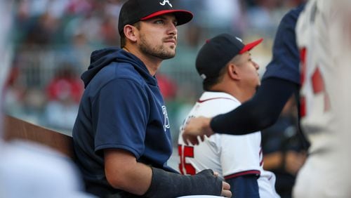 Atlanta Braves injured third baseman Austin Riley watches the action from the dugout during the first inning against the Philadelphia Phillies at Truist Park, Tuesday, August 20, 2024, in Atlanta. (Jason Getz / AJC)
