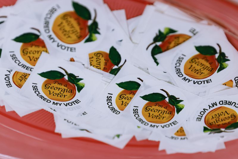 Georgia voter stickers. (Natrice Miller / natrice.miller@ajc.com)