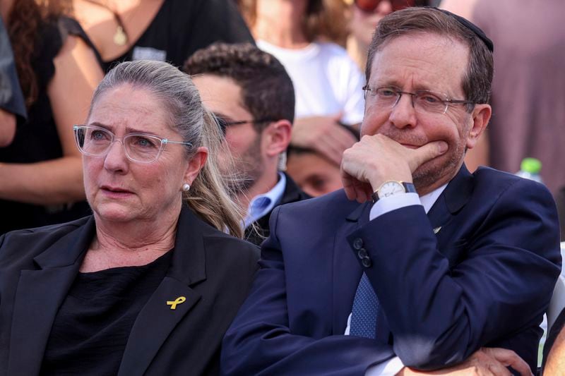 Israel's President Isaac Herzog and his wife Michal attend the funeral of Israeli-American hostage Hersh Goldberg-Polin, who was killed in Hamas captivity in the Gaza Strip, in Jerusalem, Monday, Sept. 2, 2024. (Gil Cohen-Magen/Pool via AP)